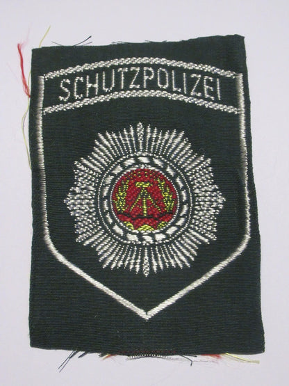 New East German Schutzpolizei insignia shoulder badge communist DDR volkspolizei