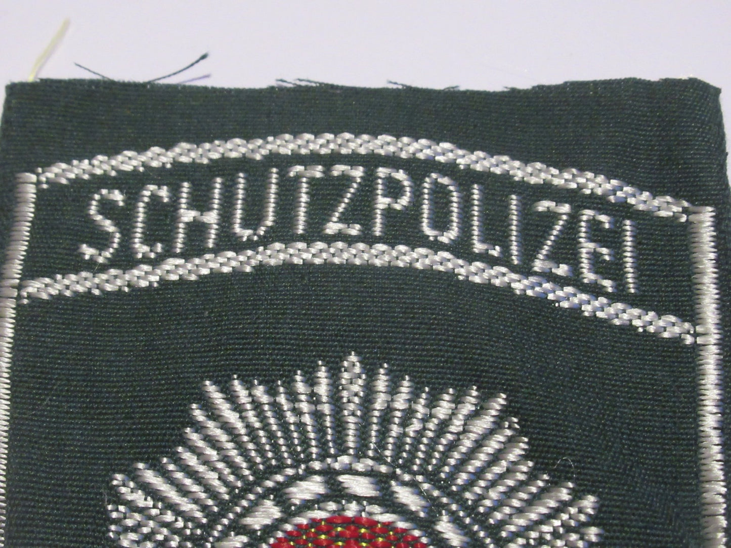 New East German Schutzpolizei insignia shoulder badge communist DDR volkspolizei