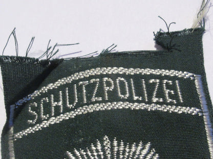 New East German Schutzpolizei insignia shoulder badge communist DDR volkspolizei