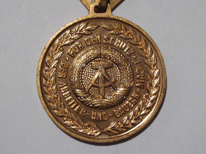 New Vintage East German NVA Reservist bronze medal insignia badge pin communist DDR